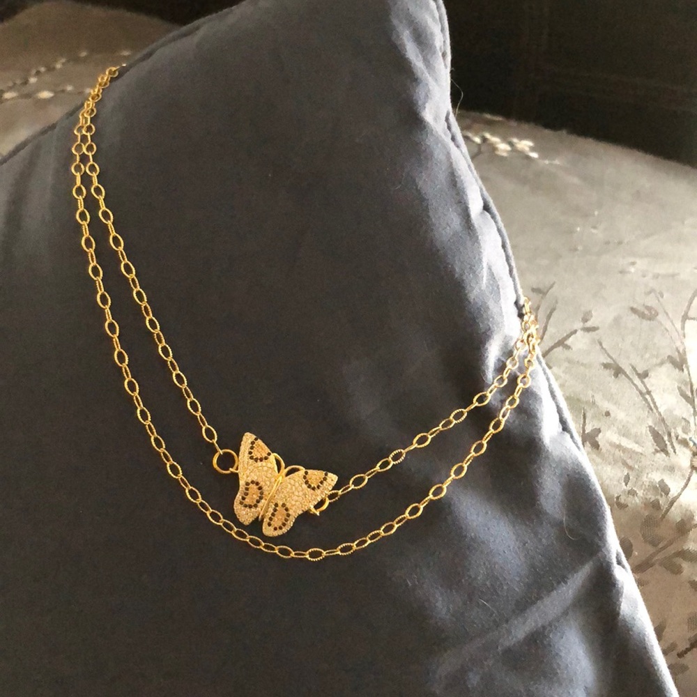 Butterfly necklace paid 50 asking 35
